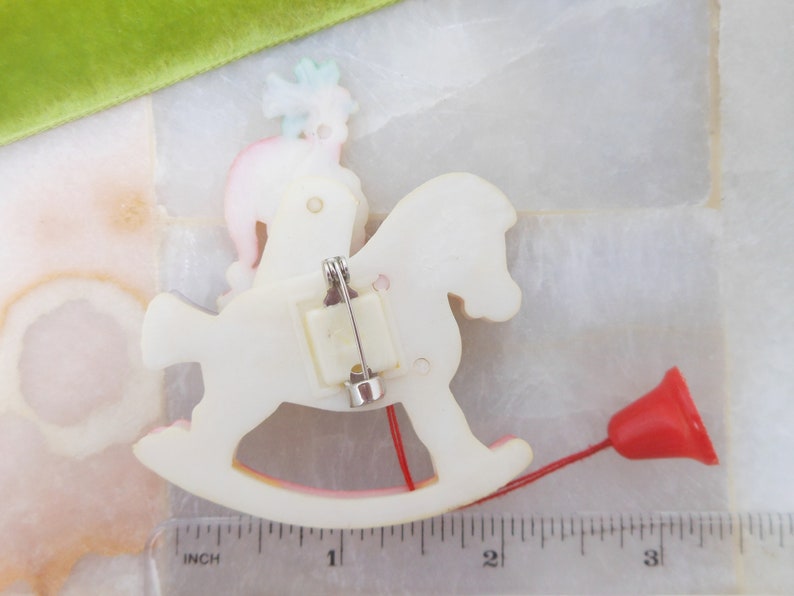 Vintage Christmas Santa Rocking Horse Brooch Pin Mechanical Plastic Kitsch Kitschmas Jewelry Gift HONG KONG Mid Century