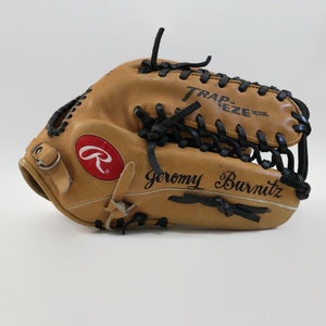 May include: A tan leather baseball glove with black stitching and a red "R" logo. The glove is signed "Jeremy Burnitz" and says "Trapeze Model" on the side.