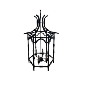 May include: Black metal pagoda-style chandelier with a hexagonal frame and five light bulbs.