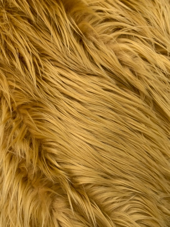 thumbnail interactive-video image 1 of Long Pile Gold Faux Fur Fabric – Crs Fur Fabrics 60" Wide Polyester By Meter 1 of 3