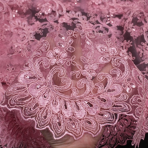 PINK DIVA DESIGN EMBROIDERY WITH HEAVY BEADED ON A MESH-SOLD BY YARD.
