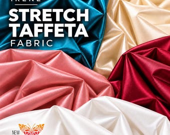 May include: Irene stretch taffeta fabric in teal, cream, pink, red, and white. The fabric is arranged in folds, creating a lustrous, reflective surface. Text on the image reads: IRENE STRETCH TAFFETA FABRIC and NEW FABRICS DAILY with a butterfly logo.