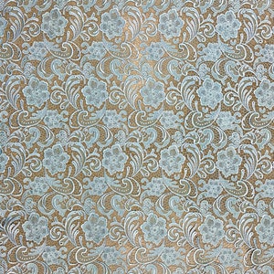 May include: A light blue lace fabric with a floral pattern. The fabric has a delicate, intricate design with small flowers and leaves.