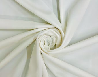 Tejido Giselle IVORY de nailon y elastano, tejido de punto mate elástico de peso medio para prendas de vestir, trajes de baño, ropa deportiva, disfraces y manualidades.