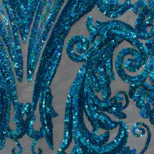 Puede incluir: Tela de lentejuelas azul turquesa con un patr&oacute;n de espiral. Las lentejuelas son iridiscentes y crean un efecto brillante.
