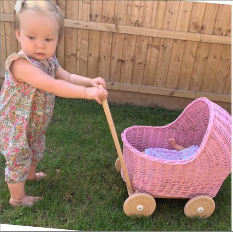 pink wicker dolls pram