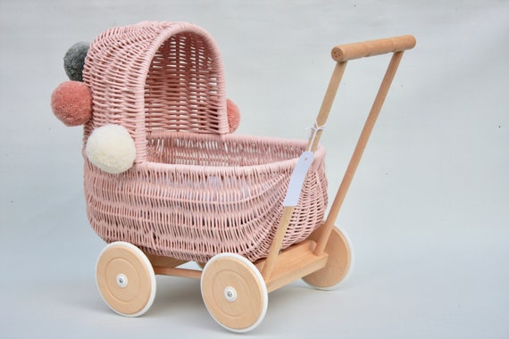 pink wicker dolls pram