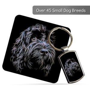May include: A black keychain with a rectangular pendant featuring a stylized dog portrait. The dog's image is a neon-like design on a black background. A matching coaster with the same dog design is also visible. The text "Over 45 Small Dog Breeds" is at the top.