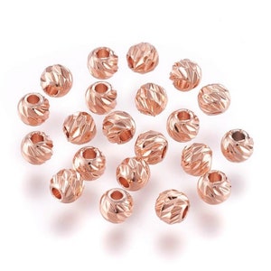 10 Rose Gold Carved Round Spacer Beads (4mm)