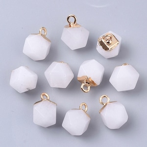 May include: Ten white geometric pendant charms with gold accents. Each charm is a small, faceted, cube-shaped pendant with a gold loop at the top for attaching to a necklace or bracelet.