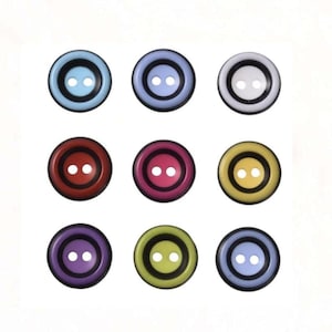 May include: Nine colorful buttons arranged in a grid. Each button is round with two holes and a contrasting inner circle. Colors include light blue, purple, red, yellow, and green. The buttons are likely for sewing or crafts.