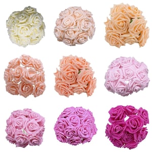 May include: Nine bouquets of artificial roses in various colours, including white, peach, light pink, and magenta. Each bouquet contains approximately 12 roses.