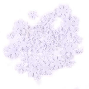 May include: A large quantity of white felt snowflake cutouts. The snowflakes are scattered on a white background.