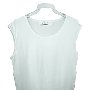 May include: White sleeveless shirt with a round neckline and a small label that reads "המה שדי" "Tchelet Mordechai".