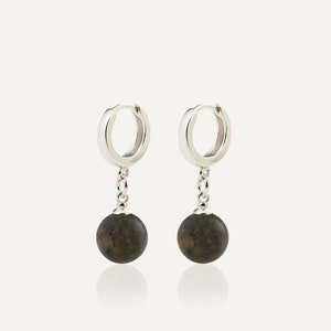 Handcrafted genuine Baltic amber jewelry, ideal as a minimalist daily accessory, unique gift for her, or sophisticated gift for lovers of modern silver gemstone drop earrings.