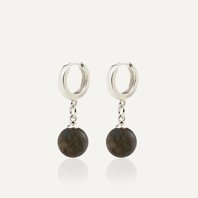 Handcrafted genuine Baltic amber jewelry, ideal as a minimalist daily accessory, unique gift for her, or sophisticated gift for lovers of modern silver gemstone drop earrings.