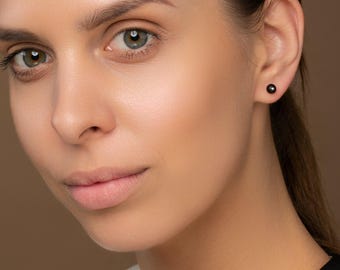 Baltic amber silver studs NERO