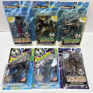May include: Collection of six action figures in original packaging. The figures include characters like Vampire, Cy-gor, Violator II, and Pilgrim. Each figure is in a plastic blister pack with a lightning bolt design and character names.
