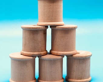 Wooden cotton reels