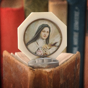 Vintage French nun of Saint Theresa in a bakelite frame, Catholic portrait, religious décor