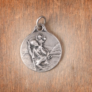 Vintage Saint Christopher pendant with a car in the background, Catholic charm, St Christopher religious medal