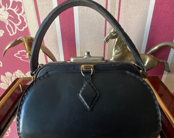 French retro vintage black leather handbag with rigid frame, 1950’s