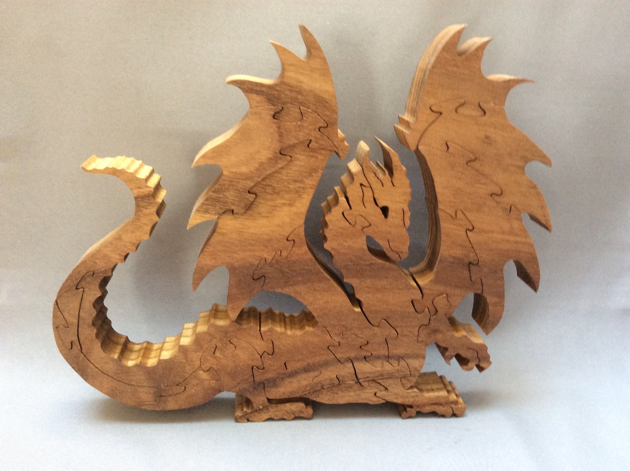 Какие годы деревянного дракона. Сувенир "дракон". Деревянная игрушка дракон. Сувенир деревянный дракон. Сувенир дракон пазл из дерева.