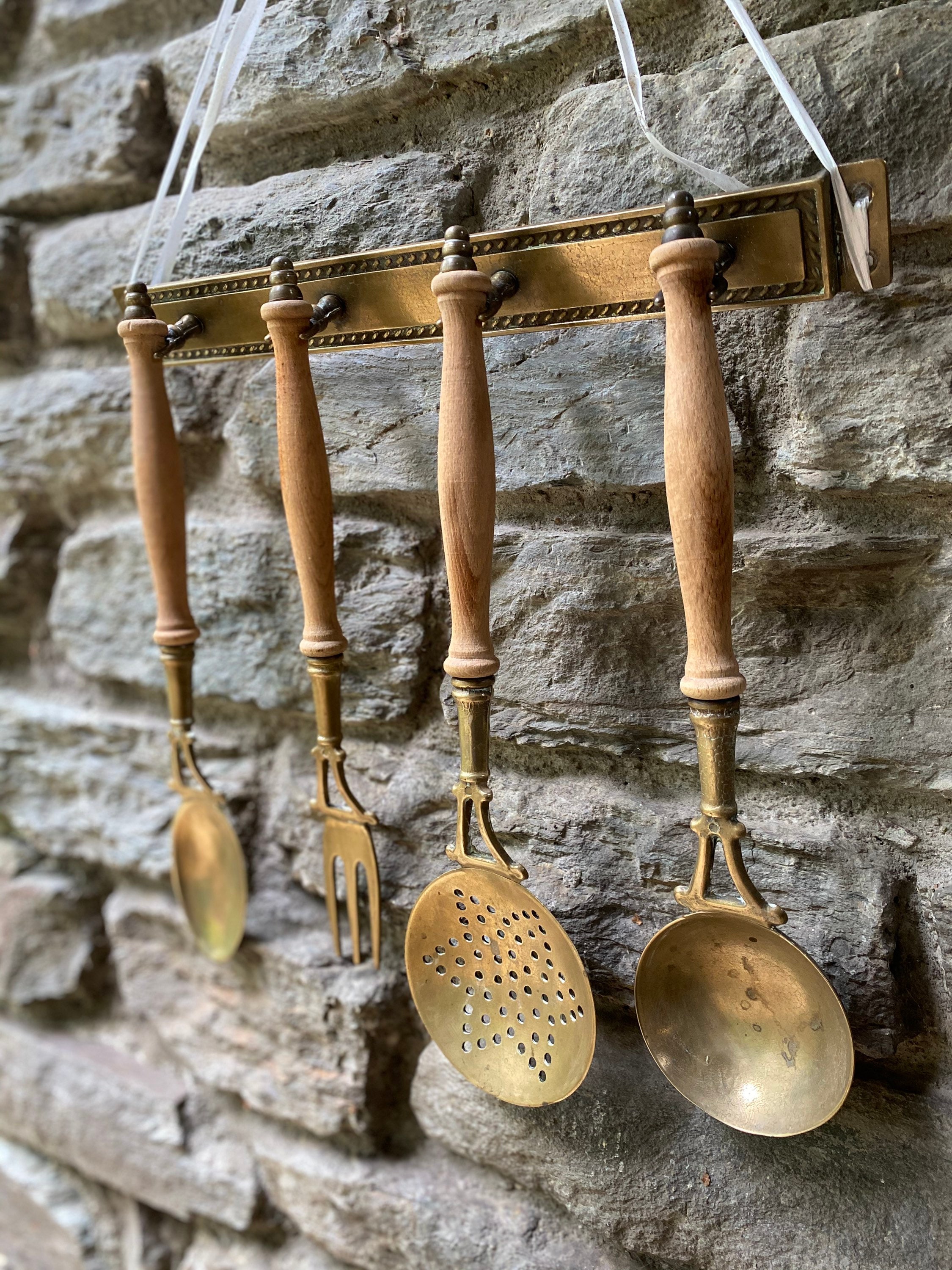 French vintage brass kitchen utensils with rail