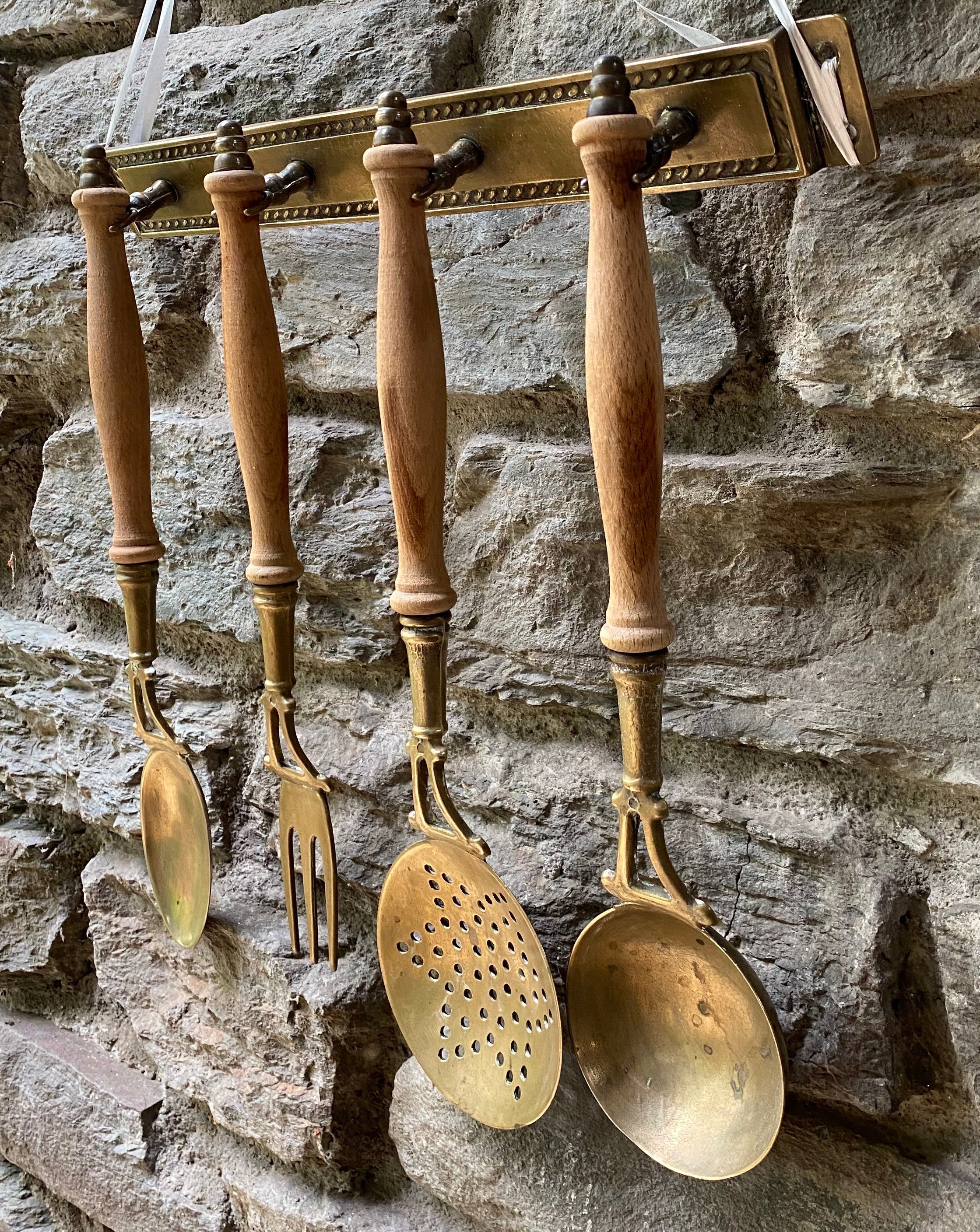 French vintage brass kitchen utensils with rail