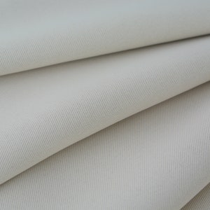 Beige Sand solid fabric Medium weight 230gsm. 100% Polyester