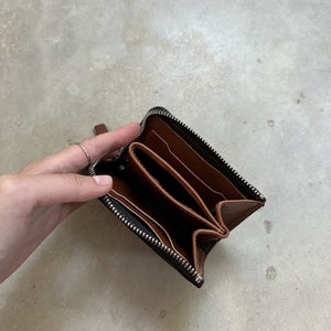 brown natural leather wallet with zipper, small leather for coins and cards, hand-crafted, inside view