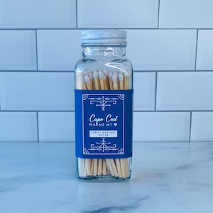 Cape Cod-veiligheidslucifers: doorzichtige decoratieve pot met sluiting