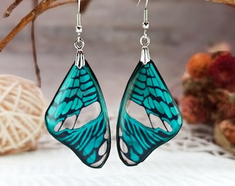 Orecchini pendenti a forma di ali di farfalla, blu turchese oceano, verdi, in resina trasparente, realistici, regalo perfetto per gli amanti della natura.