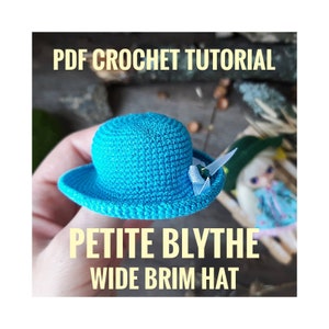 May include: PDF crochet tutorial for a blue wide brim hat for a Petite Blythe doll.