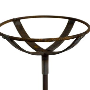 May include: A rustic metal plant stand with a circular top and a single stem. The stand is made of brown metal with a weathered finish.