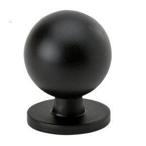 May include: Black round cabinet knob with a flat base.