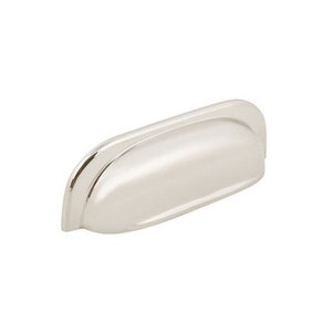 May include: A polished nickel cabinet pull with a rounded rectangular shape and a slightly curved top edge.