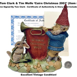 May include: A vintage Cairn Christmas 2001 figurine by Tom Clark and Tim Wolfe. The figurine features a gnome playing a trumpet, a rabbit with a horn, and the text "Cairn Christmas 2001". Includes a certificate of authenticity.