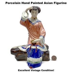 Asian Woman Geisha Figurine Putting Flowers In Her Hair Porcelain Hand Painted Glazed Vintage