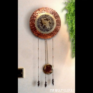 Hare Pendulum Clock Copper/Brass Arts&Crafts +/- 12"/30cm diam 24"/60cm height not inc dangles. Really handmade in Cornwall by UK craftsman.