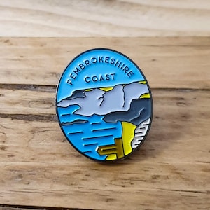 Pembrokeshire Coast National Park enamel adventure pin