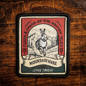 Écusson lièvre variable