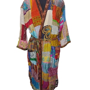 May include: A long, colorful patchwork robe with a brown sash. The robe is made of silk and has a variety of patterns and colors, including red, orange, yellow, green, blue, purple, and brown.
