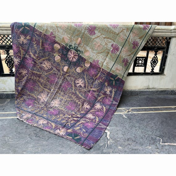 Discover an extraordinary Vintage Kantha Quilt – a rare, hand-stitched Indian masterpiece with intricate embroidery, an ideal gift