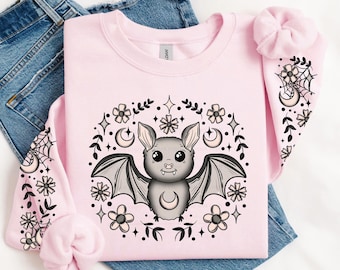 Sudadera con capucha rosa bebé con diseño de murciélago floral - Tallas S-5XL - Moda gótica - Top alternativo de Halloween con murciélagos espeluznantes - CERO ADUANAS GARANTIZADO