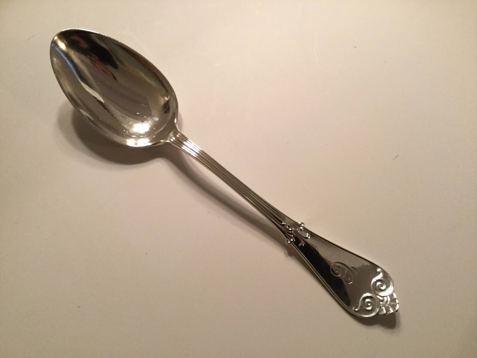 One Tiffany sterling silver serving spoon in the iconic Etsy