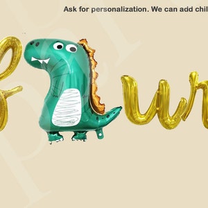 May include: Gold foil letter balloons spelling "four" with a green dinosaur balloon in the middle.