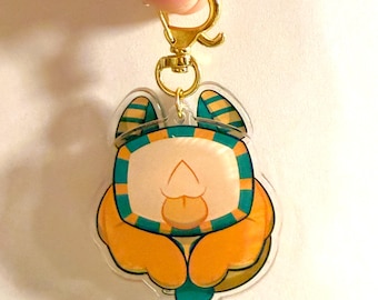 Charm para hacer vibrar las orejas con forma de esfinge Tenna