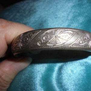 Moroccan Jewelry, old fine silver Berber engraved Fez bangle with an unusual sun pattern, 2 3/8 inches inner diameter