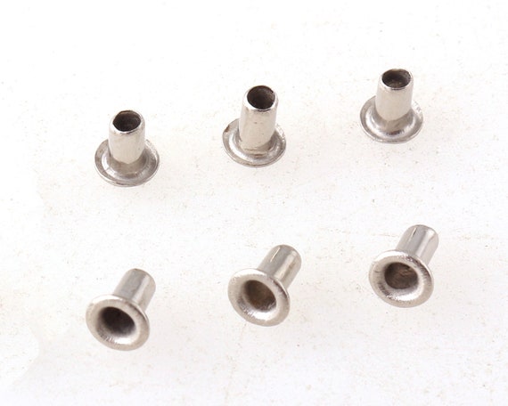 Tiny metal clearance grommets